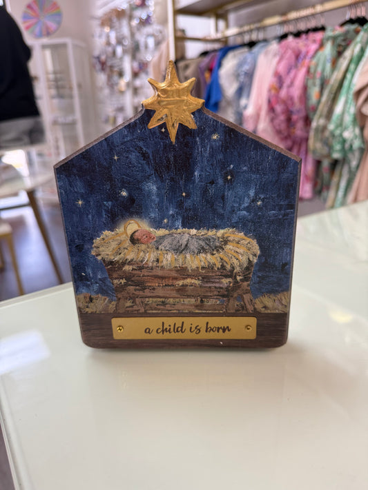 A Child is Born Plaque